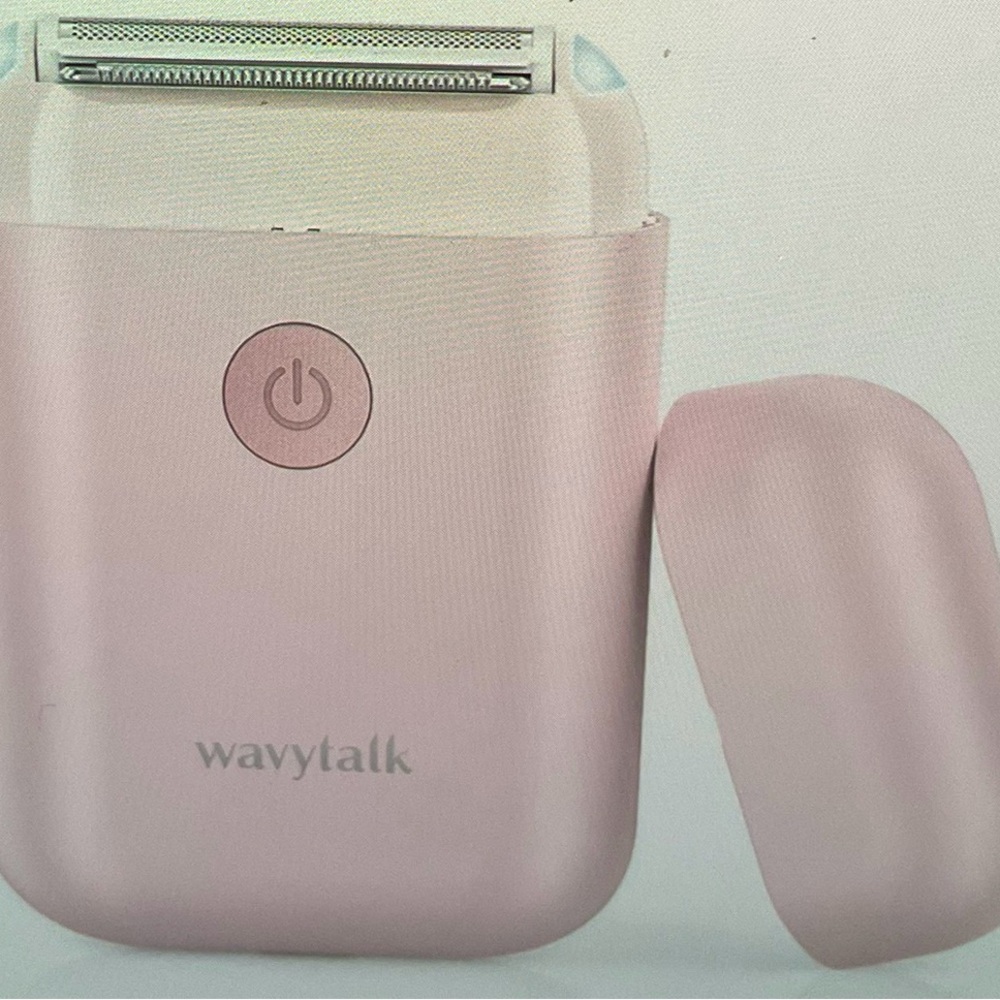 Wavytalk Portable Electric Razor. Cordless, USB Rechargeable. Color is Pink. NIP